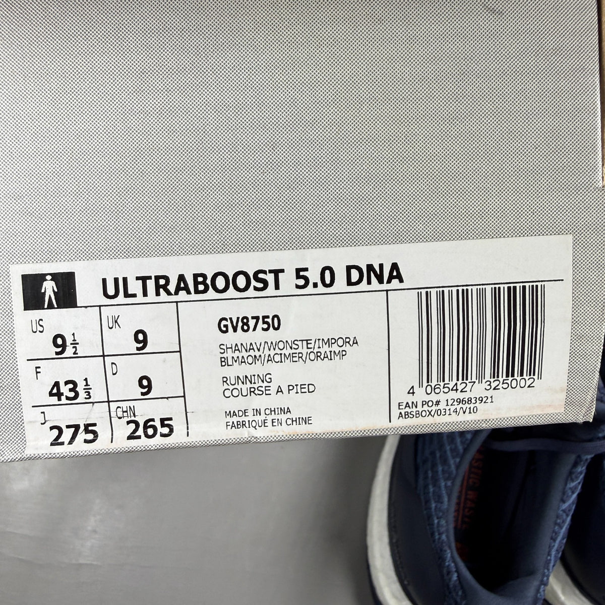 Adidas running shoes blue with Boost cushioning and iconic three-stripe logo.