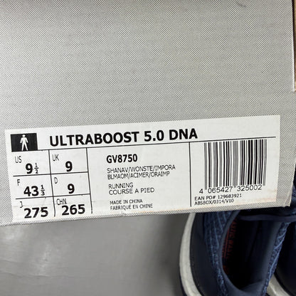 Adidas running shoes blue with Boost cushioning and iconic three-stripe logo.
