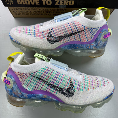 Nike multicolor Flyknit trainers in grey with distinctive air cushioning and logo detail.