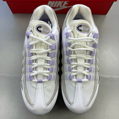 Nike Air Max 95 OG Big Bubble white trainers with hydrangea pattern and logo details.