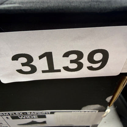 Nike trainers black with Air Max cushioning and signature swoosh logo.