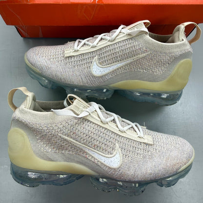 Nike Air VaporMax 2021 FK white trainers with breathable knit upper and signature swoosh logo.