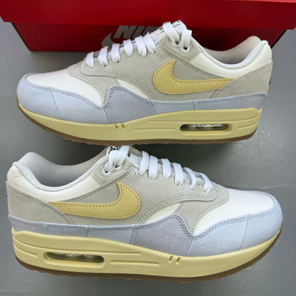 Nike Air Max 1 trainers beige with crepe sole and subtle logo detailing.