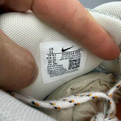 Nike beige trainers leopard tortoise shell pattern with logo detail.