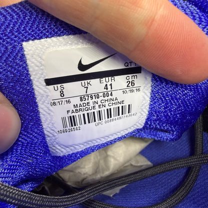 Nike Air Max 95 Ultra black trainers with blue accents and mesh upper.