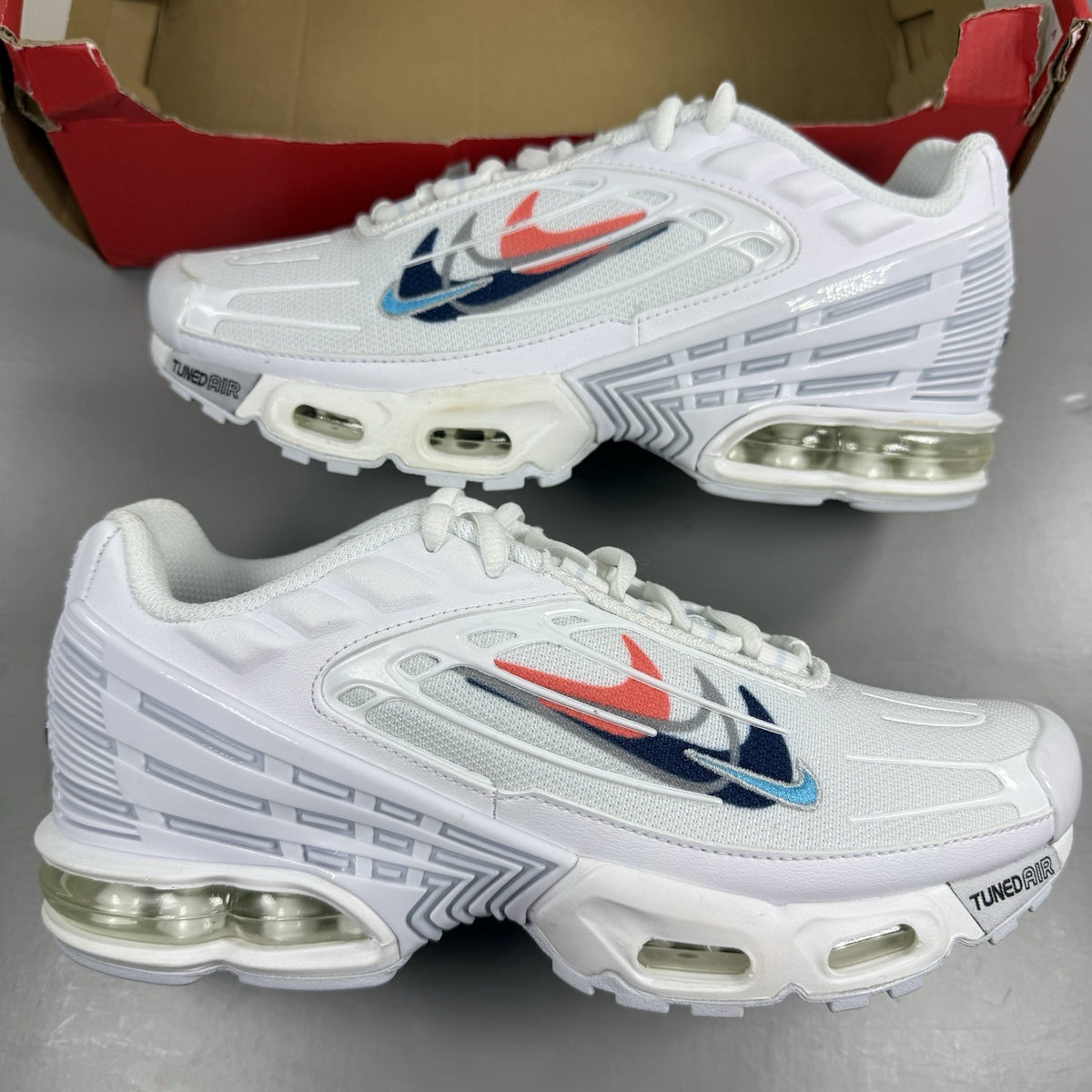Nike Air Max Plus 3 white trainers with multi Swoosh logo and breathable mesh upper.