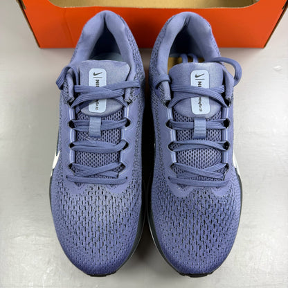 Nike blue trainers with mesh upper and swoosh logo, size UK 6.