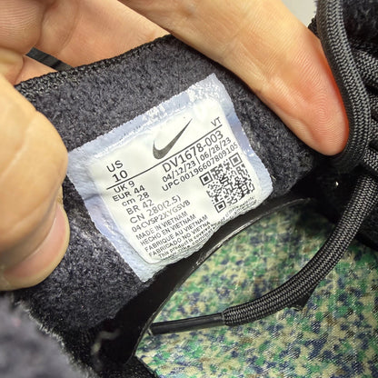 Nike Air VaporMax 2023 black Flyknit sneakers with visible logo and sleek design.