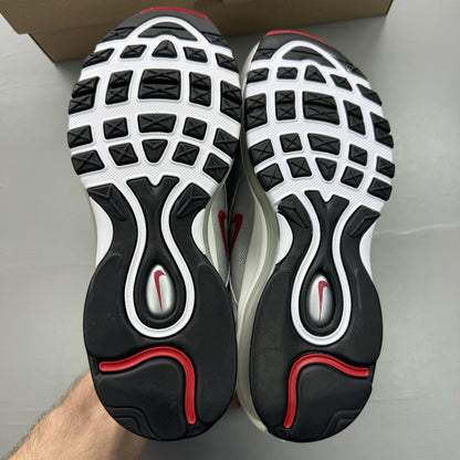 Nike Air Max 97 silver trainers with metallic finish and signature swoosh logo.