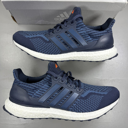 Adidas running shoes blue with Boost cushioning and iconic three-stripe logo.