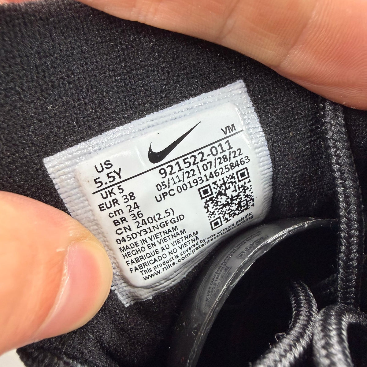 Nike Air Max 97 black trainers with anthracite accents and signature swoosh logo.