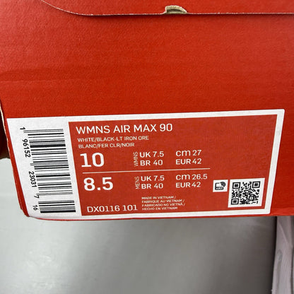 Nike Air Max 90 white trainers with black and red accents, featuring iconic logo and design.