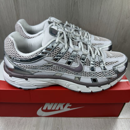 Nike P-6000 trainers grey with platinum violet accents and mesh upper details.