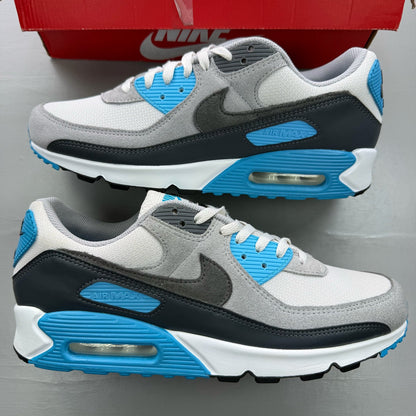 Nike Air Max 90 grey trainers with blue accents and signature swoosh logo.