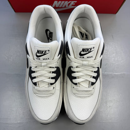 Nike deck shoes white with croc print texture and logo detail.