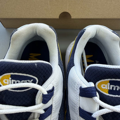 Nike Air Max 95 trainers white with navy and yellow accents, featuring logo on tongue.