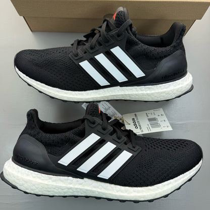 Adidas black Ultra Boost 5.0 trainers with white accents and logo detailing.