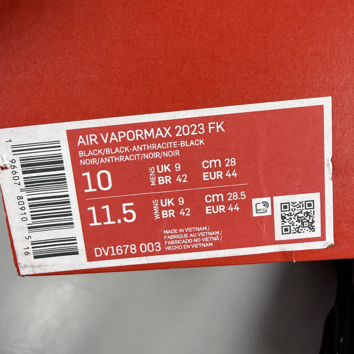 Nike Air VaporMax 2023 black Flyknit sneakers with visible logo and sleek design.