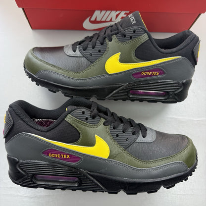 Nike Air Max 90 trainers black with Gore-Tex material and cargo khaki accents.