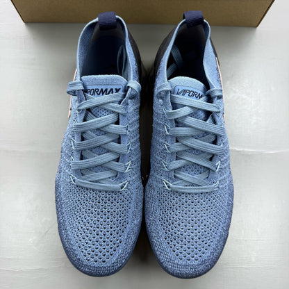 Nike blue trainers with Flyknit upper and Air cushioning technology.