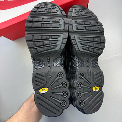 Nike Air Max Plus TN 3 black leather trainers with distinctive wave pattern and logo.