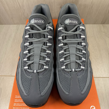 Nike Air Max 95 trainers grey with black accents and textured material.