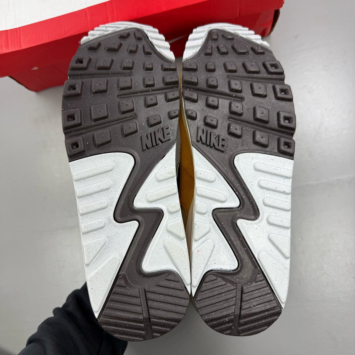 Nike beige trainers leopard tortoise shell pattern with logo detail.