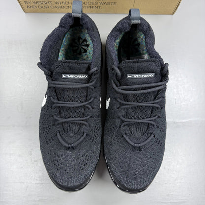 Nike black Air VaporMax trainers with Flyknit upper and signature swoosh logo.