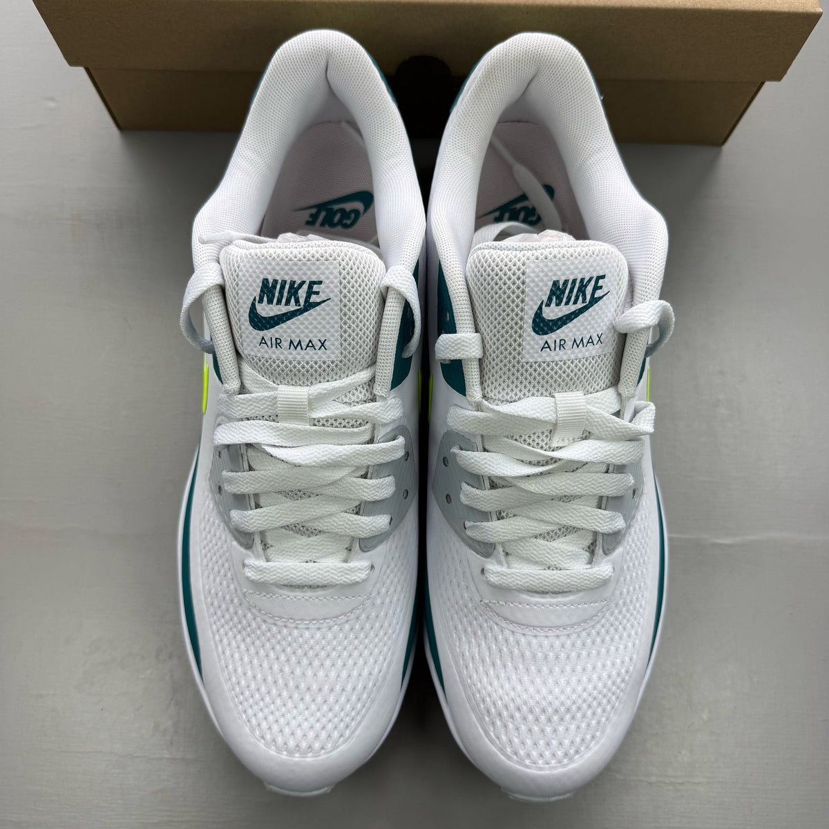 Nike Air Max 90 white golf shoes with bright spruce and volt accents, authentic design.