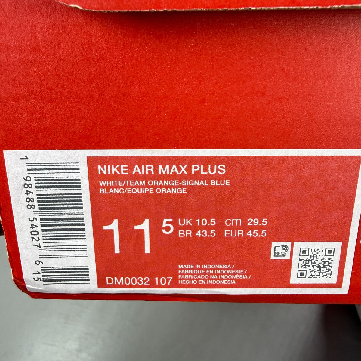 Nike running shoes white with Signal Blue accents and Air Max cushioning.