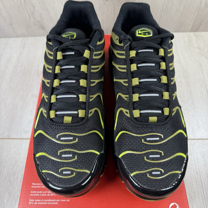 Nike Air Max Plus TN trainers black with moss green accents and signature logo.