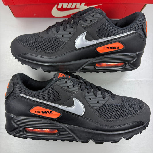 Nike running shoes black with total orange and reflective silver accents.
