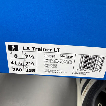 Adidas black deck shoes with blue and white accents, featuring classic logo design.