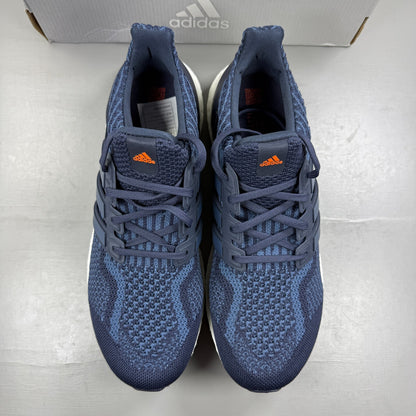 Adidas running shoes blue with Boost cushioning and iconic three-stripe logo.