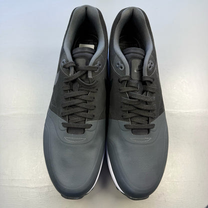 Nike Air Max 1 Ultra 2 black trainers with white accents and sleek design.