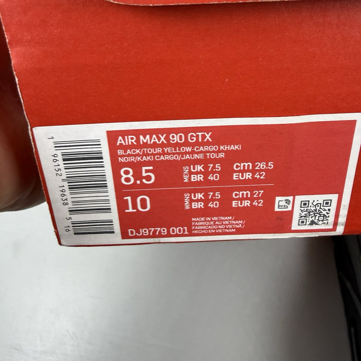 Nike Air Max 90 trainers black with Gore-Tex material and cargo khaki accents.