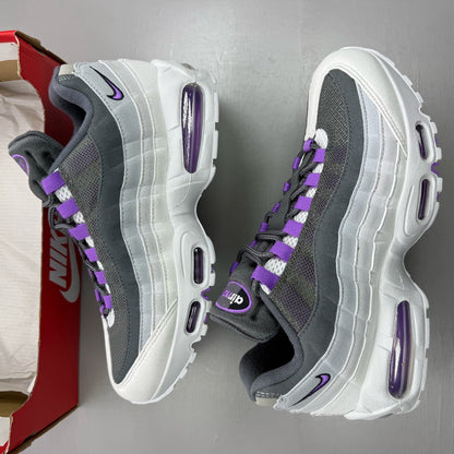 Nike Air Max 95 grey trainers with big bubble sole and logo detailing.