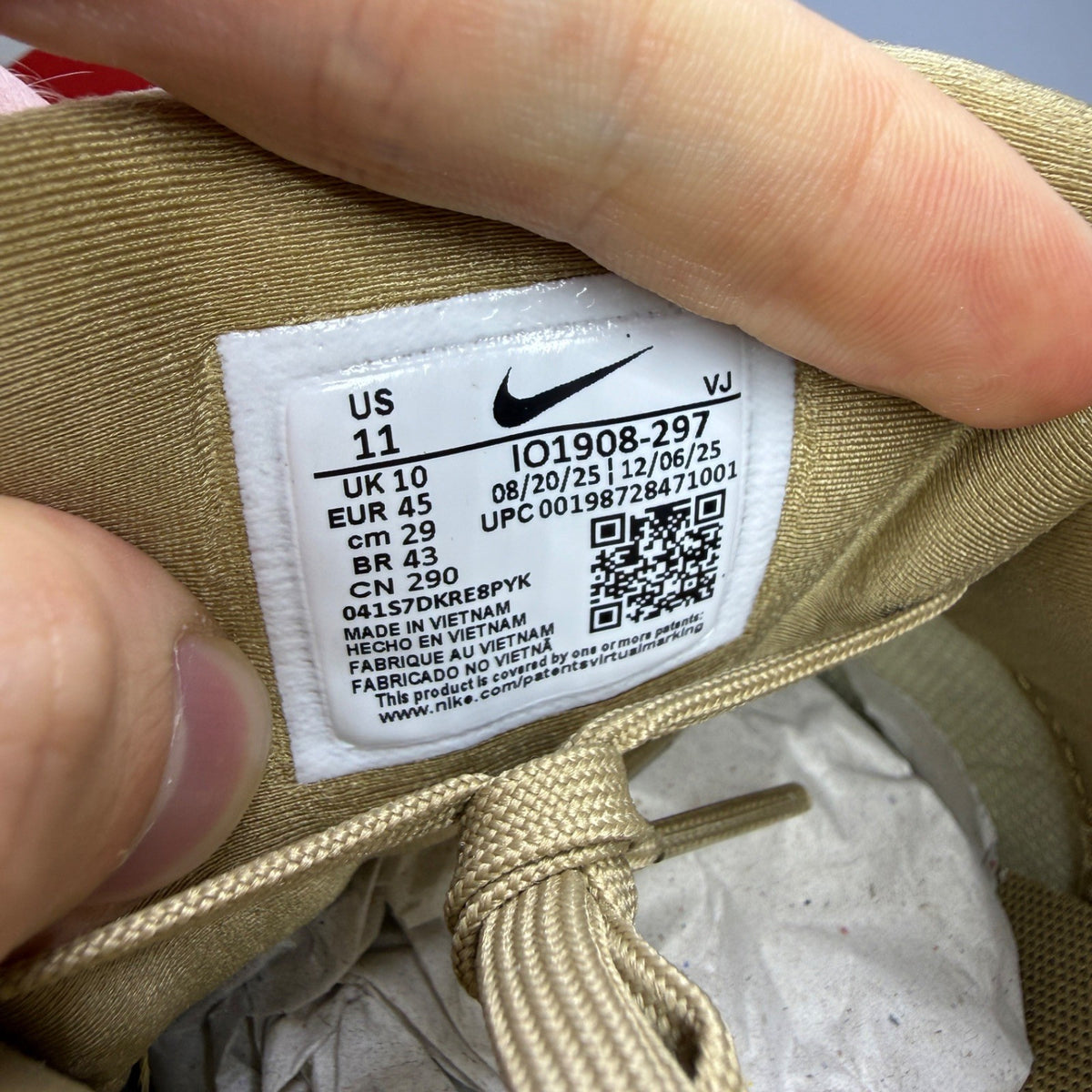 Nike Air Max 90 beige sneakers with black accents and khaki details.