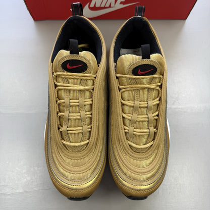 Nike Air Max 97 gold trainers with white and black accents, featuring a sleek design.