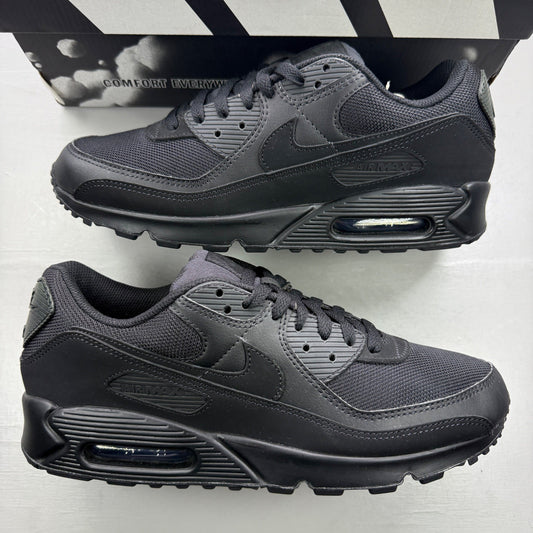Nike trainers black with sleek design and iconic Air Max cushioning.