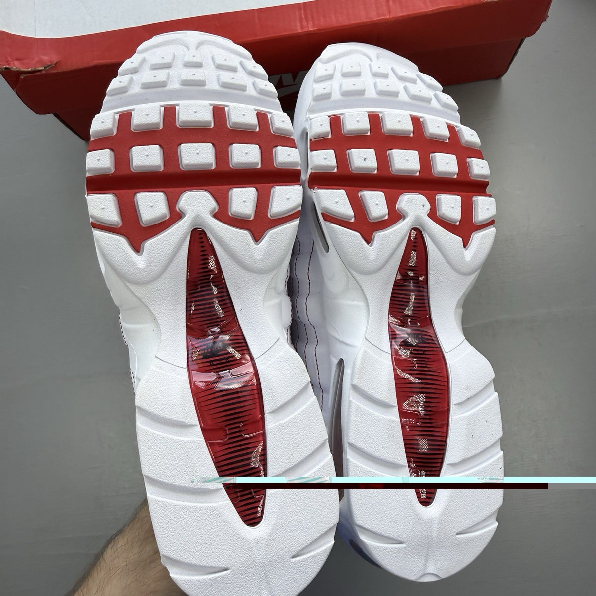 Nike Air Max 95 trainers white with university red accents and signature big bubble sole.