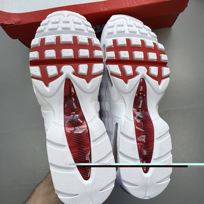 Nike Air Max 95 trainers white with university red accents and signature big bubble sole.