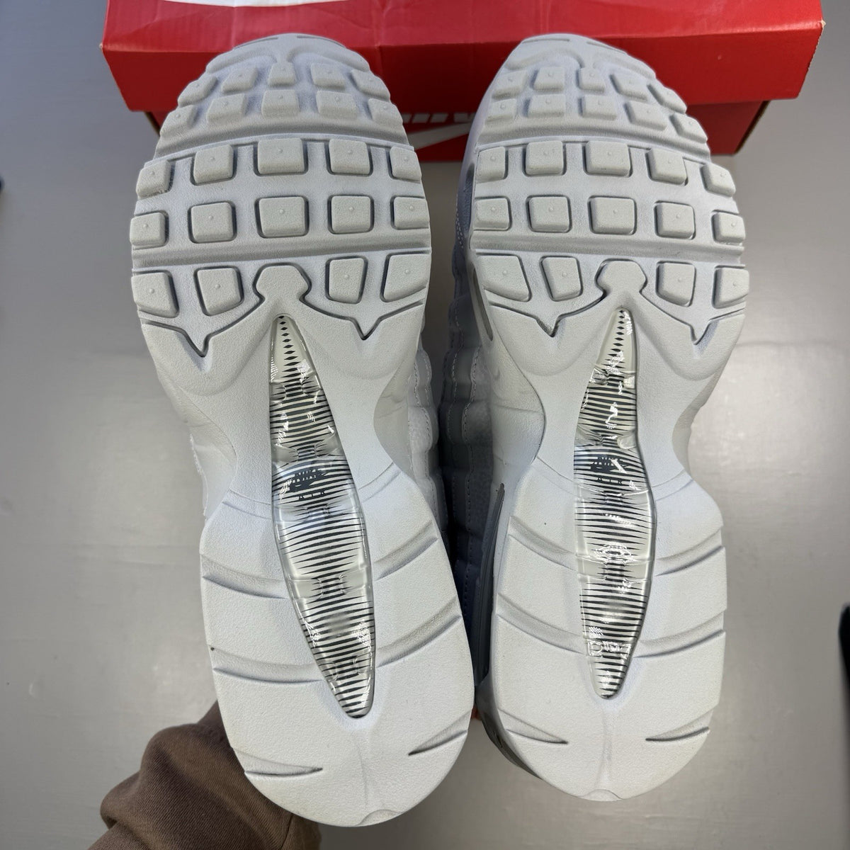 Nike Air Max 95 trainers grey with big bubble design and signature logo.