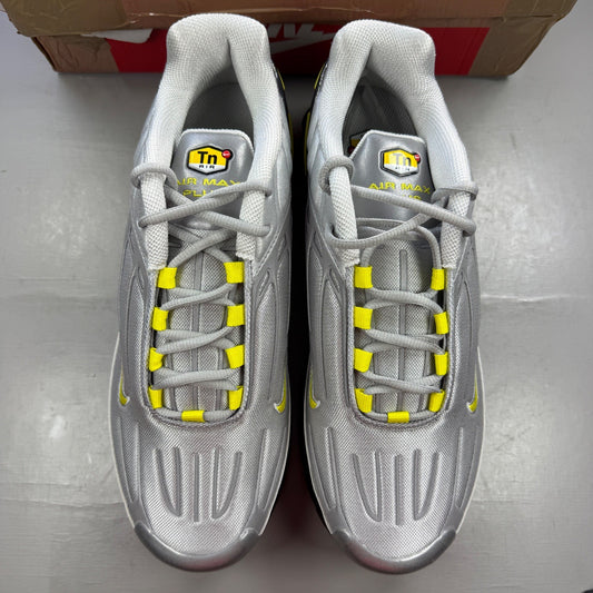 Nike Air Max Plus 3 TN metallic silver with yellow accents and signature logo.
