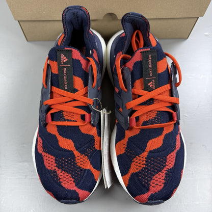 Adidas red Ultra Boost 22 trainers with Marimekko floral pattern and Parley branding.