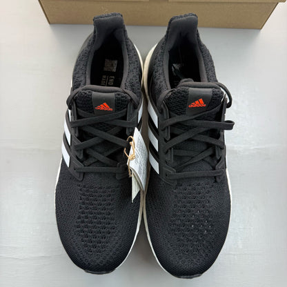 Adidas black Ultra Boost 5.0 trainers with white accents and logo detailing.