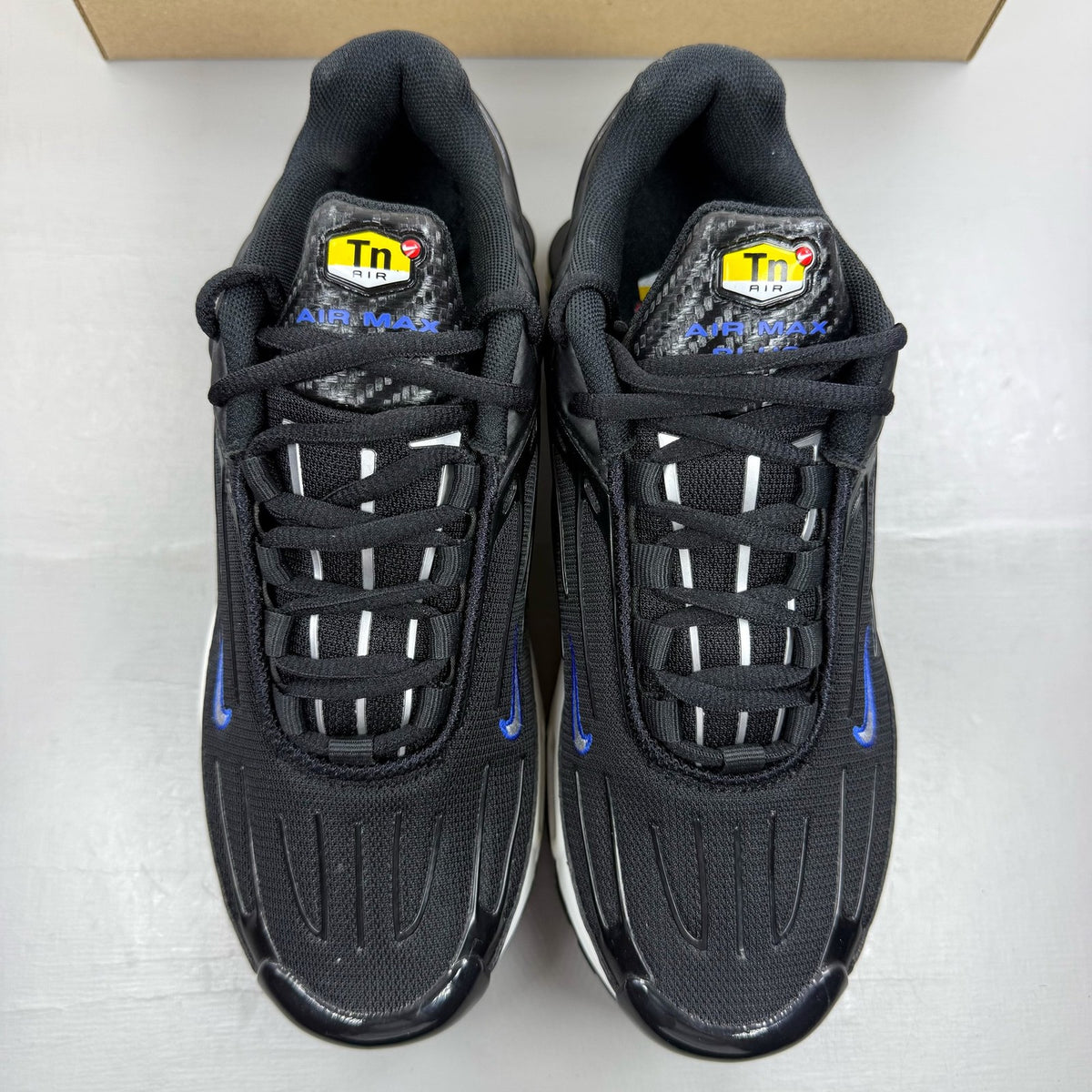 Nike black Air Max Plus TN 3 trainers with blue and silver accents, authentic design.