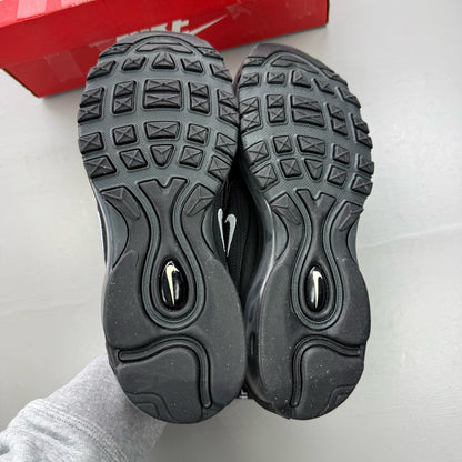 Nike Air Max 97 black trainers with anthracite accents and signature swoosh logo.