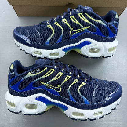 Nike Air Max Plus TN blue trainers with yellow accents and signature swoosh logo.
