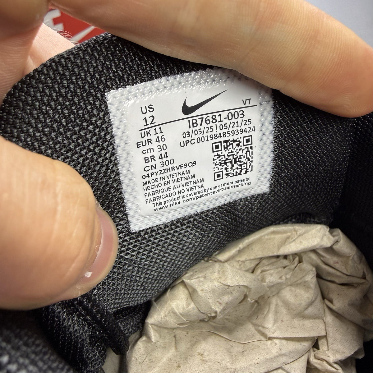 Nike Air Max 95 Ultra black trainers with grey accents and signature logo details.